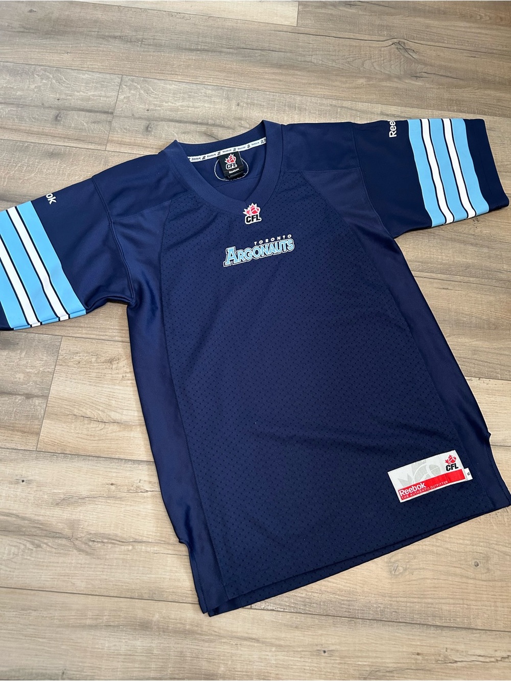 Reebok Toronto Argonauts Navy Blue Football Jersey with Light Blue Stripes